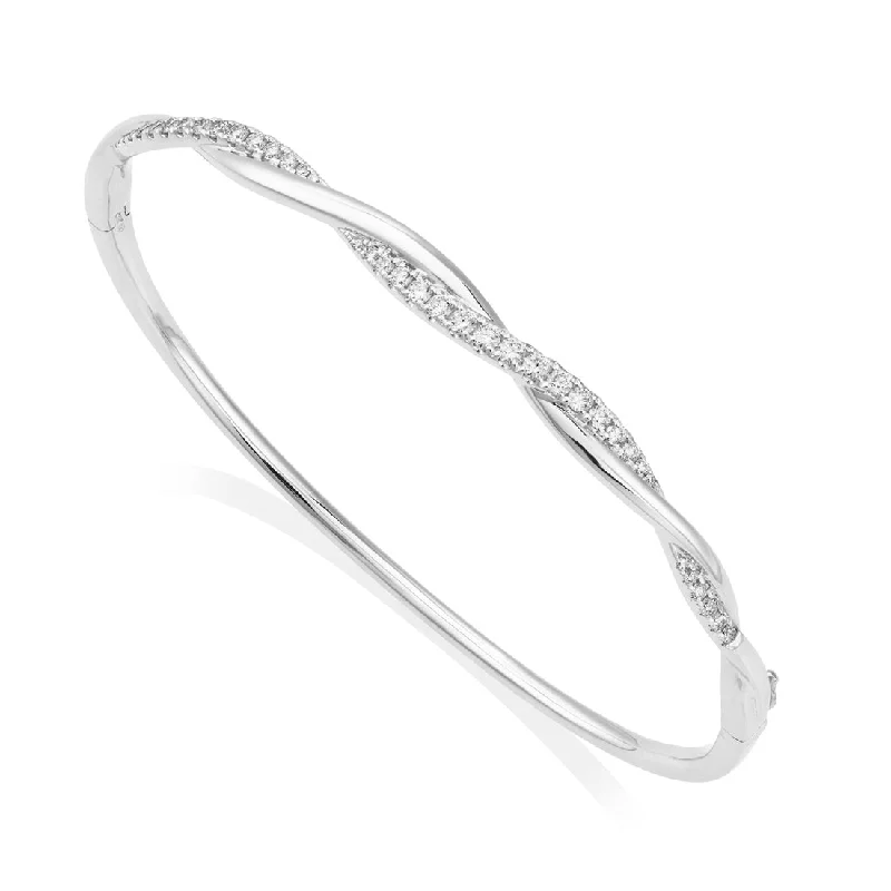 Simple Gold Bangles-18ct white gold twisted top diamond claw set bangle