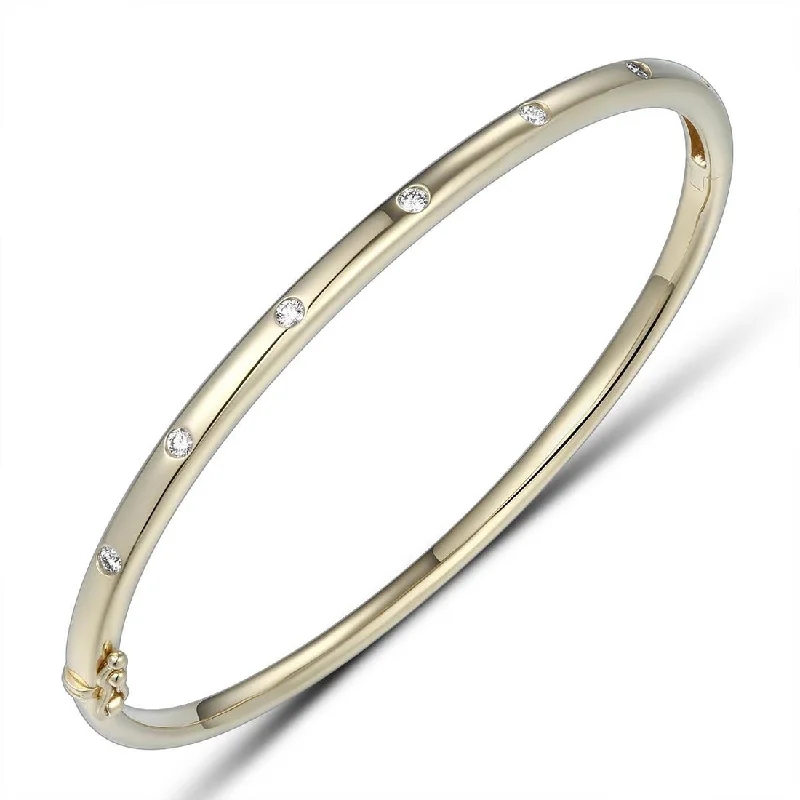 Simple Silver Bangles-18ct Gold yellow gold 7 inset spaced out across the top diamond set bangle